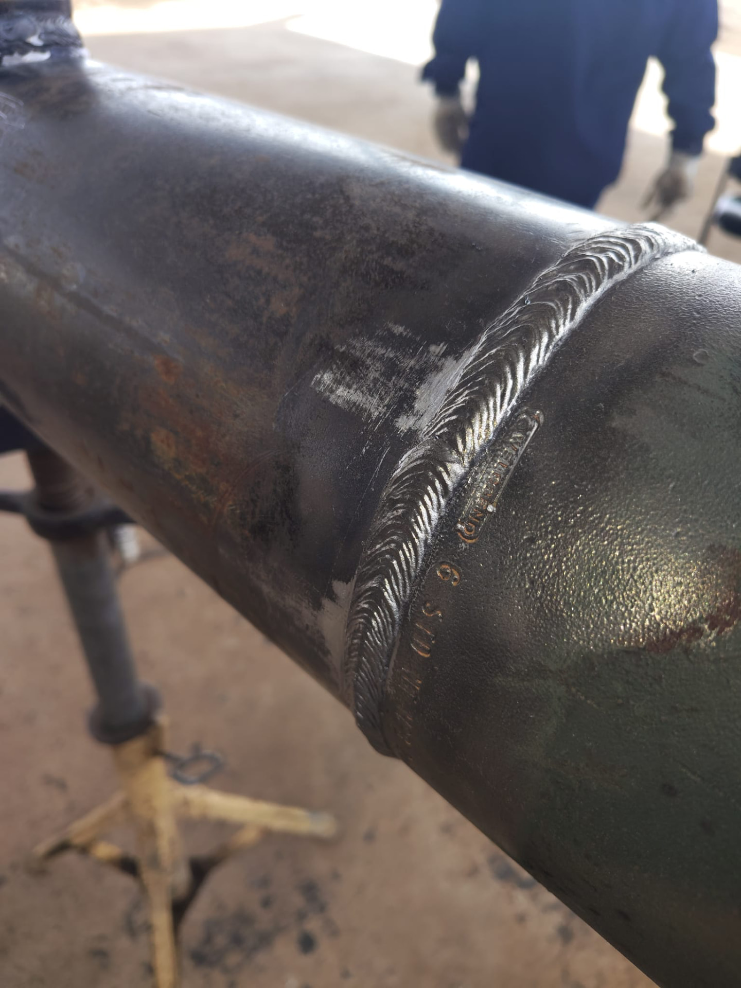 Close-up of a smooth weld pass on a pipe spool